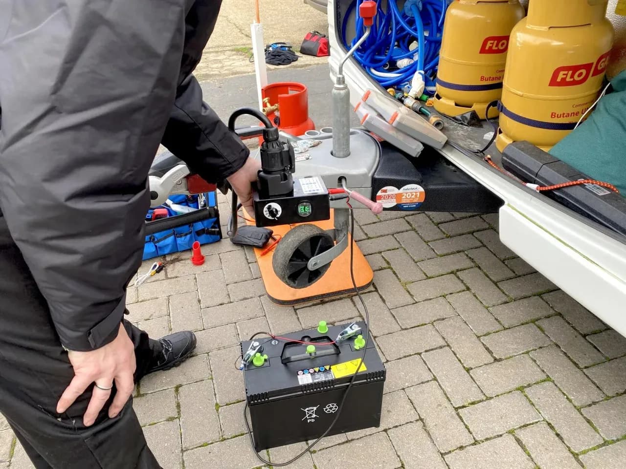 Caravan gas system and 12V electrical safety check during a mobile habitation inspection